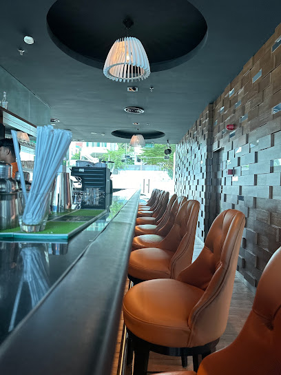 by the beach Bar at Mercure Penang Beach