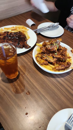 Howdy Grillhouse - Gastronomi dan perhotelan