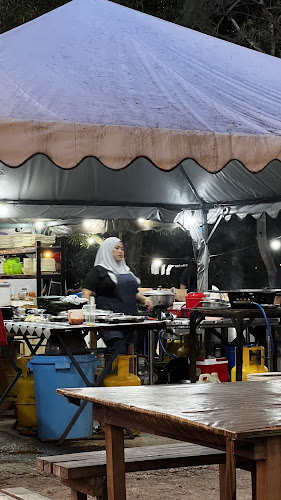 IKAN BAKAR BERAPI BATU OMPEK - Gastronomi dan perhotelan