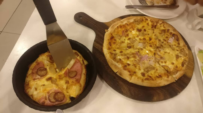 Pizza Hut - Gastronomi dan perhotelan